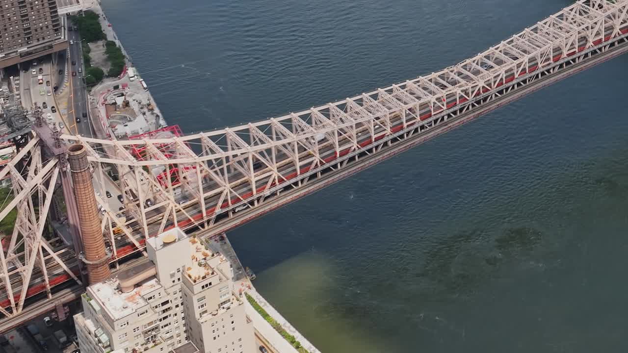 Stunning aerial view of Queensboro Bridge above East River in New York City