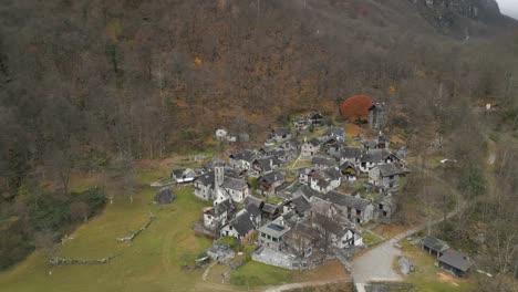 drone strafing above stone houses located in the village of cavergno, in the district of vallemaggia, bordering italing in the canton of ticino, in switzerland