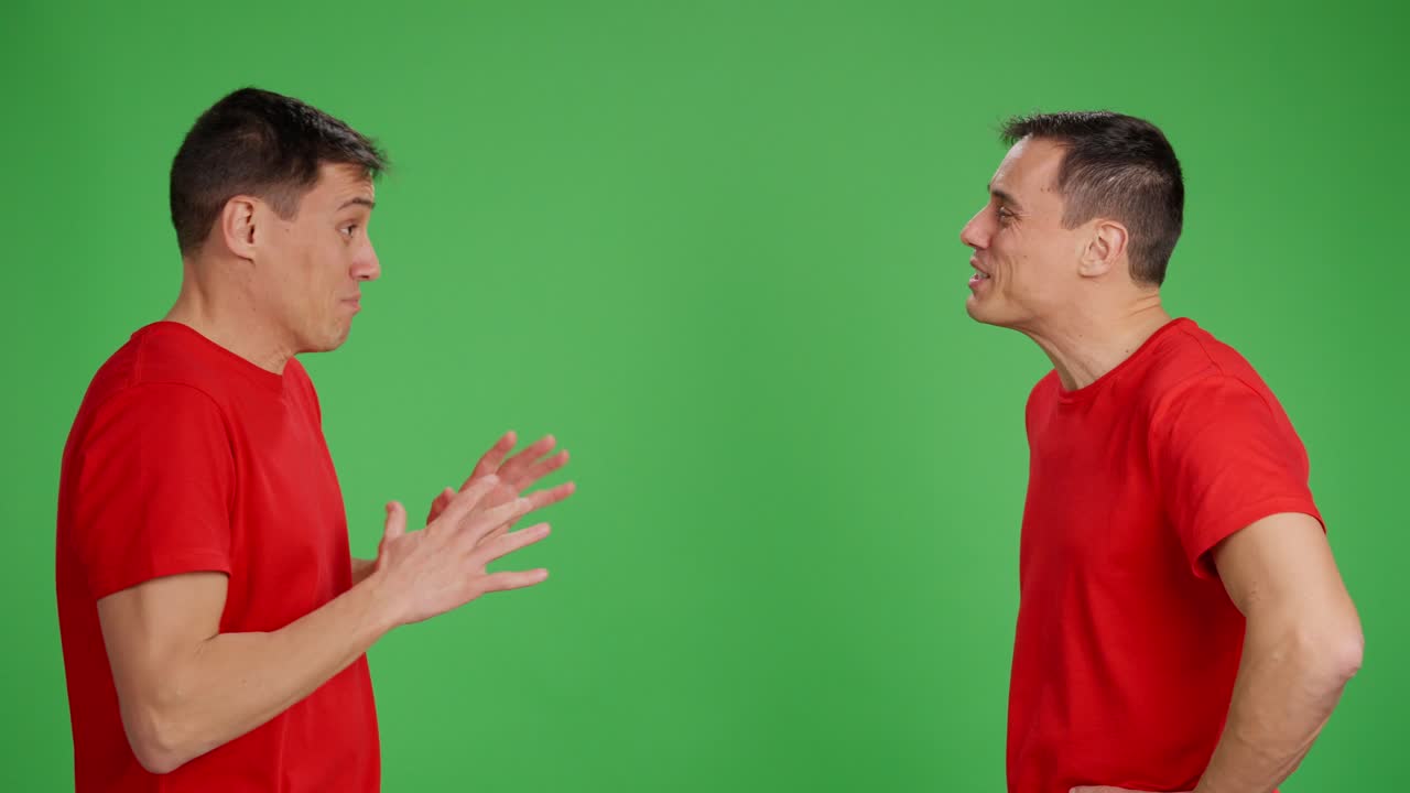 Happy man talking to himself on green screen