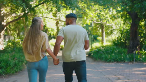 love, date and couple running in a park together