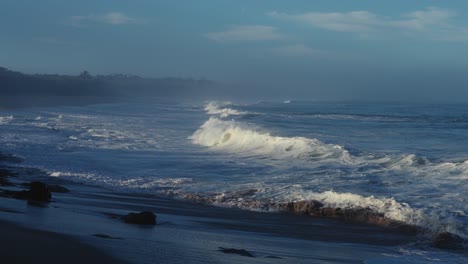 beautiful slow motion slo mo ocean waves crashing and breaking off the sea shore in hawaii