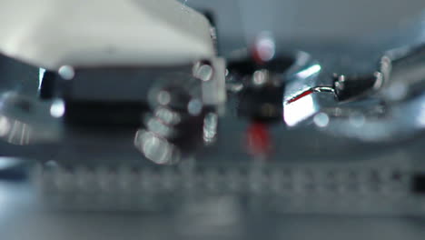 Sewing needle in slow motion. Close up of sewing needle