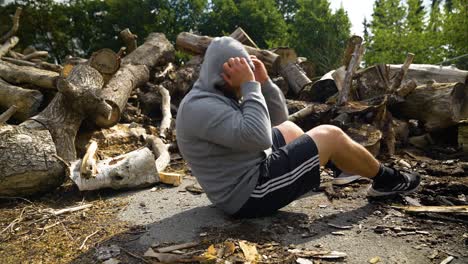 a man engaging in sit-ups as part of his training routine - close up