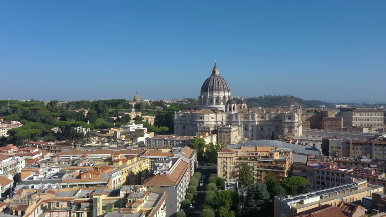 Aerial rising above St. Peter’s Basilica, and revealing its majestic dome, and the vast Piazza San Pietro, symbolizing the heart of the Catholic Church and Rome’s timeless beauty