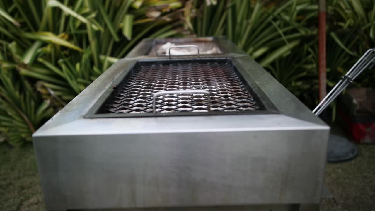 Zoom out shoot of metal net grill for barbecue