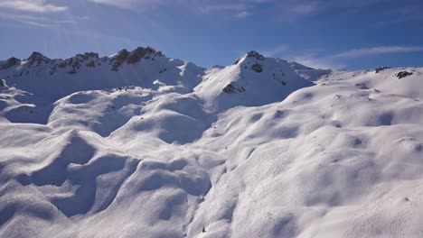 skiing tracks in deep snow drone shot