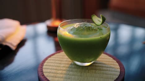 matcha and lime cocktail on tatami mat coaster, close shot 4k