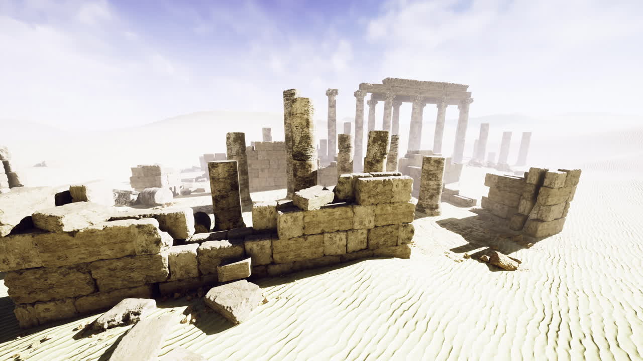 Ruins of an ancient temple in a sandy desert under a bright sky