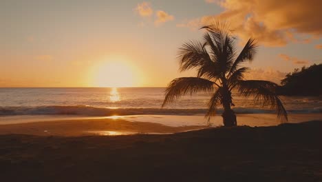 Drone-crane-shot-of-a-beach-sunset