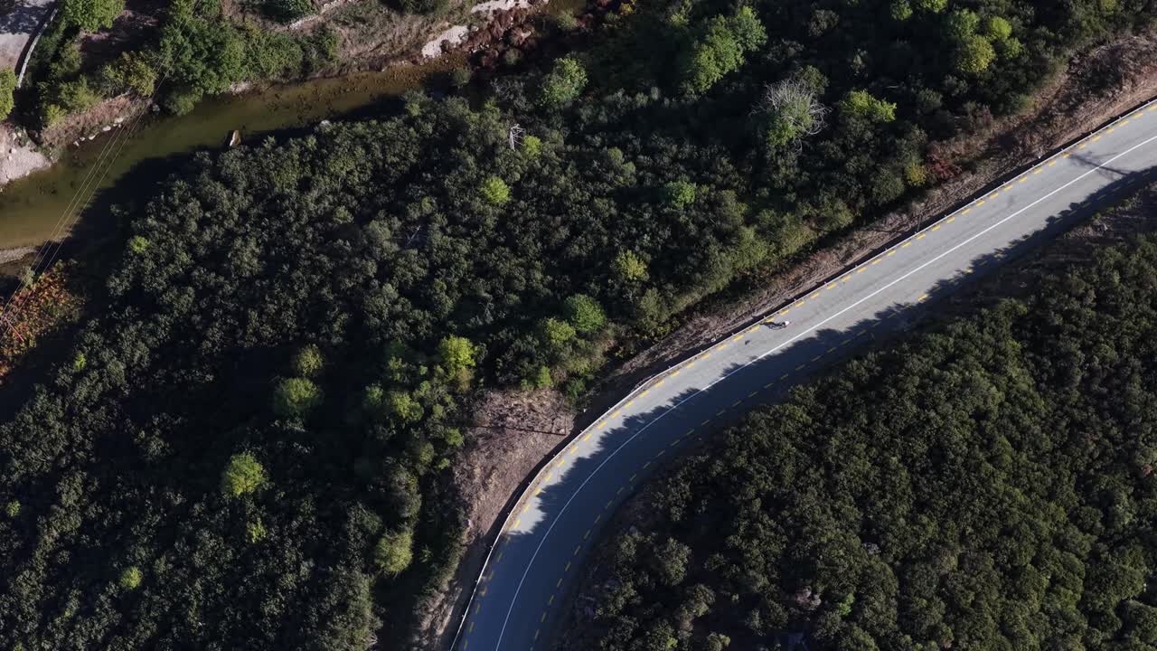 Lonely cyclist on the near a river