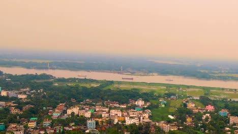 Toma-Panorámica-Aérea-Del-Río-Kirtankhola-En-Bangladesh-Al-Atardecer