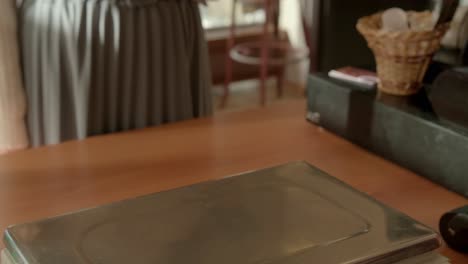 Woman paying for groceries at a bakery