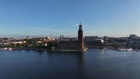drone flying to famous tower of stockholm town hall