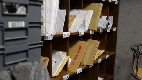 a post office mail room and sorting office with letters and shelving