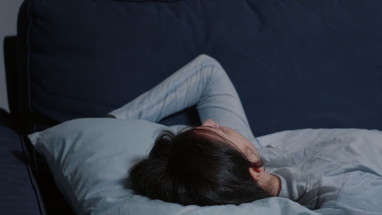 Depressed worried emotionally unstable vulnerable woman staring into space
