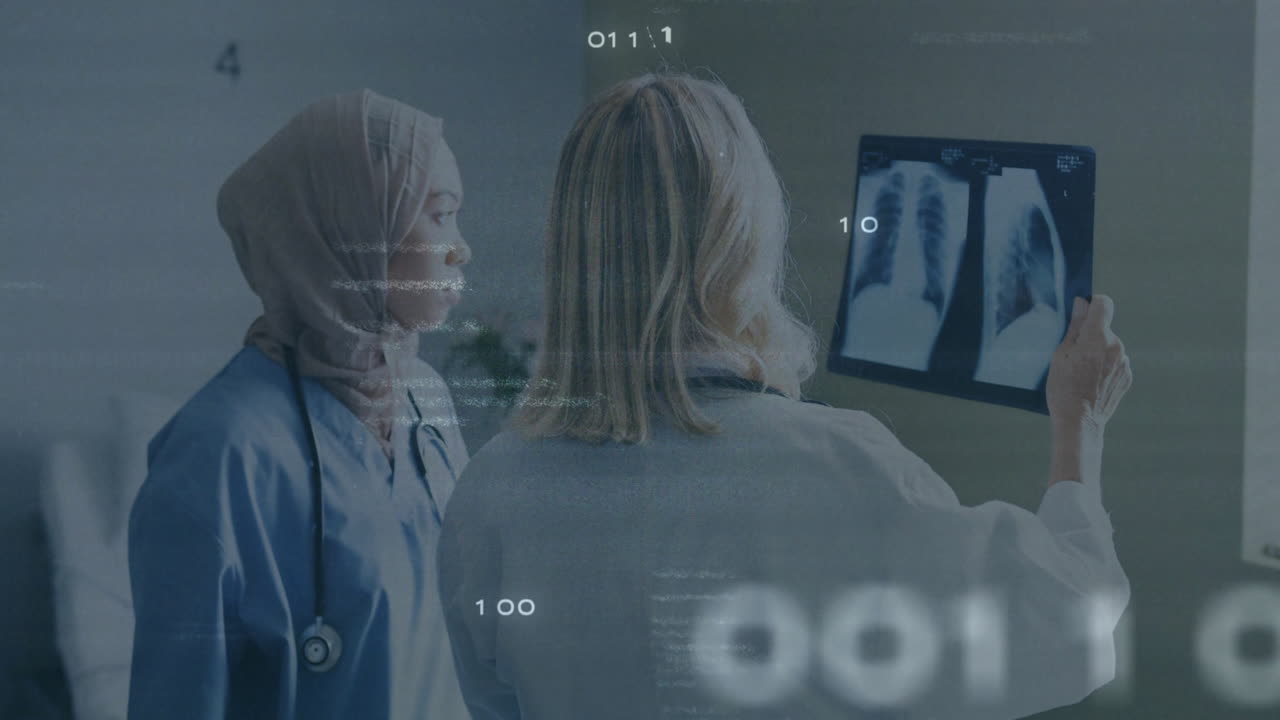Examining X-ray images, doctors using digital data overlay in medical office