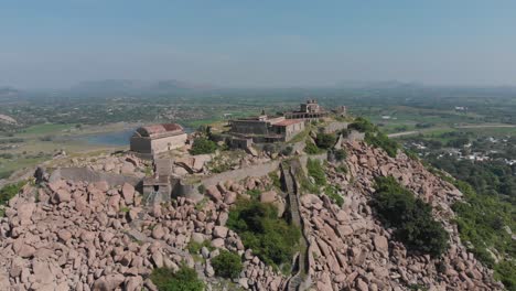 Krishnagiri-fort-standing-alone-on-a-mountain-top-overlooking-beautifuil-landscape-bellow,-India