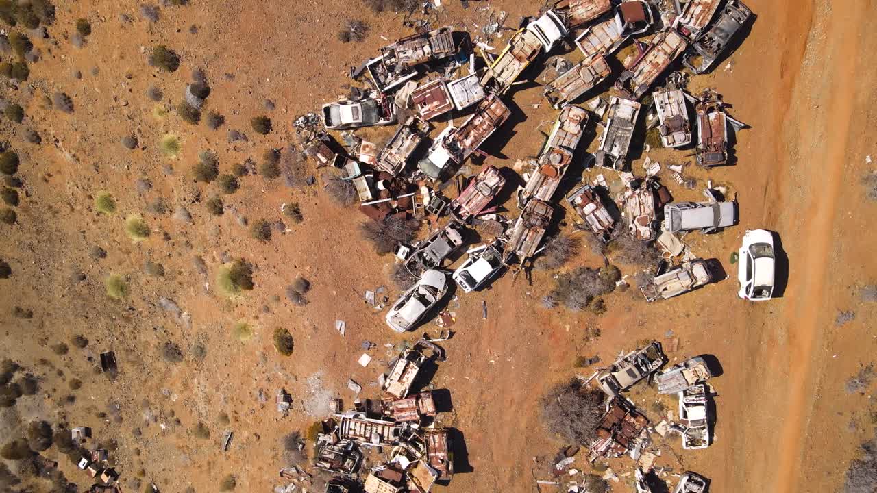 Aerial top-down view of a junkyard on Cedros Island