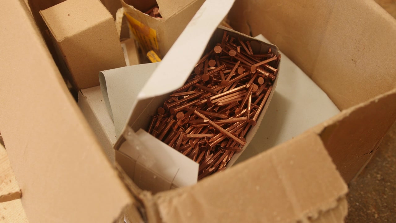 Copper nails in box for traditional clinker boat building