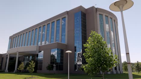 oakland county courthouse in michigan with gimbal video walking forward on angle