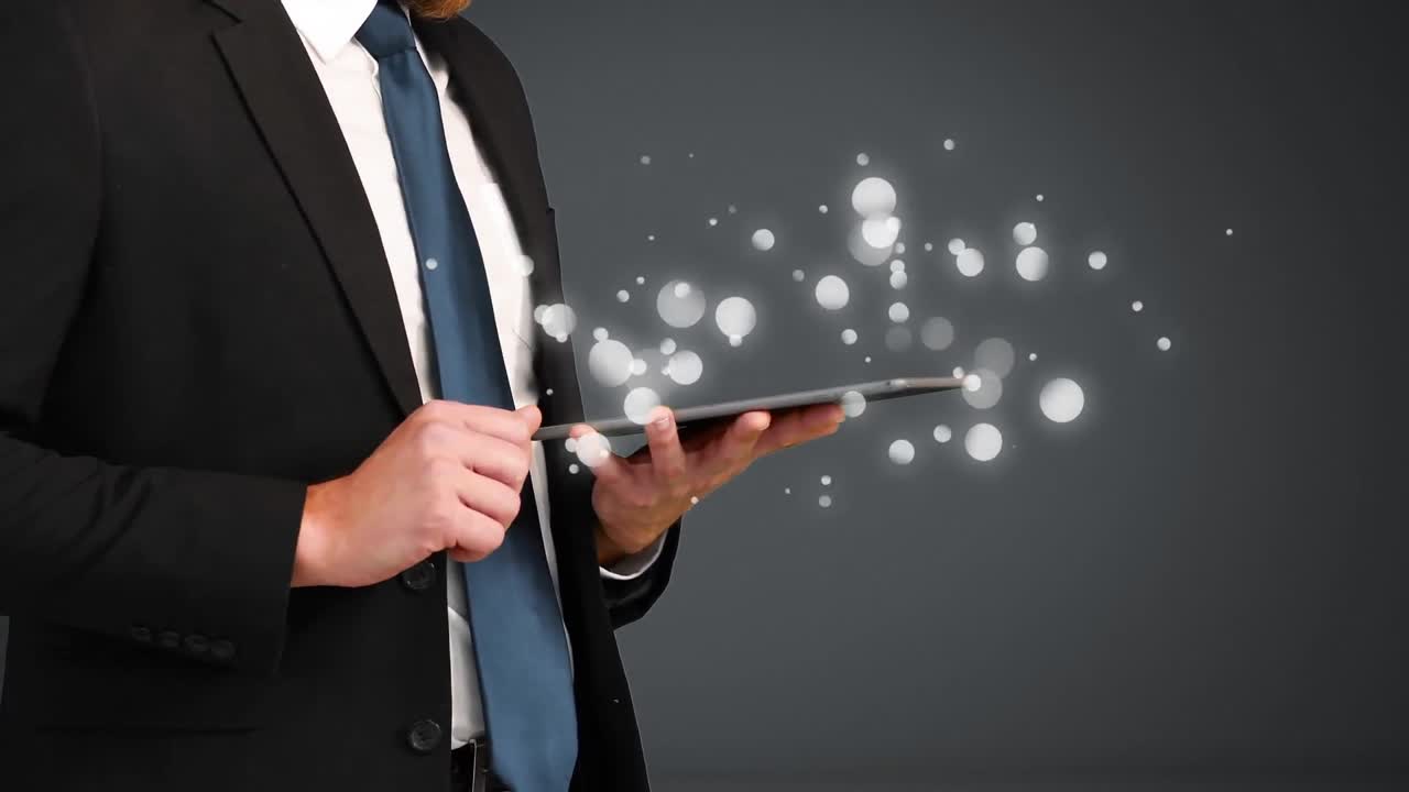 ⁇  거품으로 둘러싸인 디지털 태블릿을 사용하는 사업가