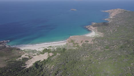 Wreck-Beach-With-Tranquil-Blue-Sea-In-Great-Keppel-Island,-Queensland,-Australia---aerial-drone-shot