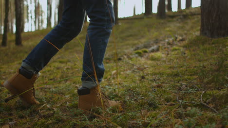 Man-Walks-along-the-Mountains-to-the-Top.-Tourist-in-Boots-Going-along-the-Stone-Road-on-the-Background-a-Beautiful-Landscape.-Travel-Concept-Active-People-on-the-Way-to-Victory-Move-Forward-Close-Up.-High-quality-4k-footage