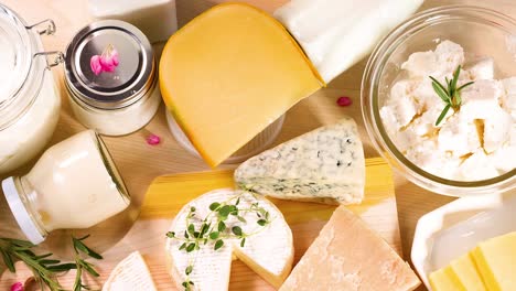 variety of dairy products on wooden background