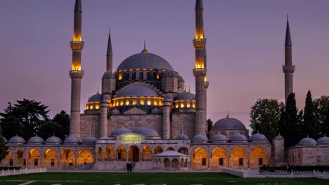 selimiye mosque glowing with sunset illumination, revealing ornate ottoman architectural details and towering minarets in edirne's historic landscape