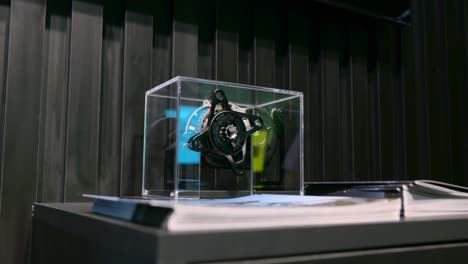 DJI Avinox E-bike Drive Unit Displayed Inside Glass Box At IFA Exhibition In Berlin, Germany. closeup shot