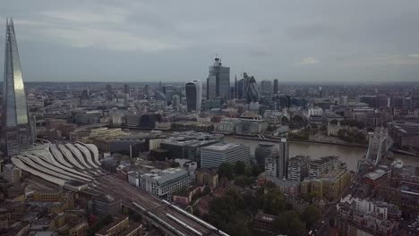 Panoramic-aerial-view-of-The-Shard,-downtown-London,-and-Tower-Bridge