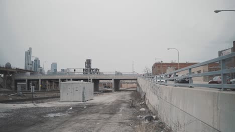 gloomy cityscape: urban landscape with railroad tracks and overpass