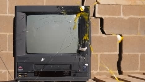 egg thrown at old tv