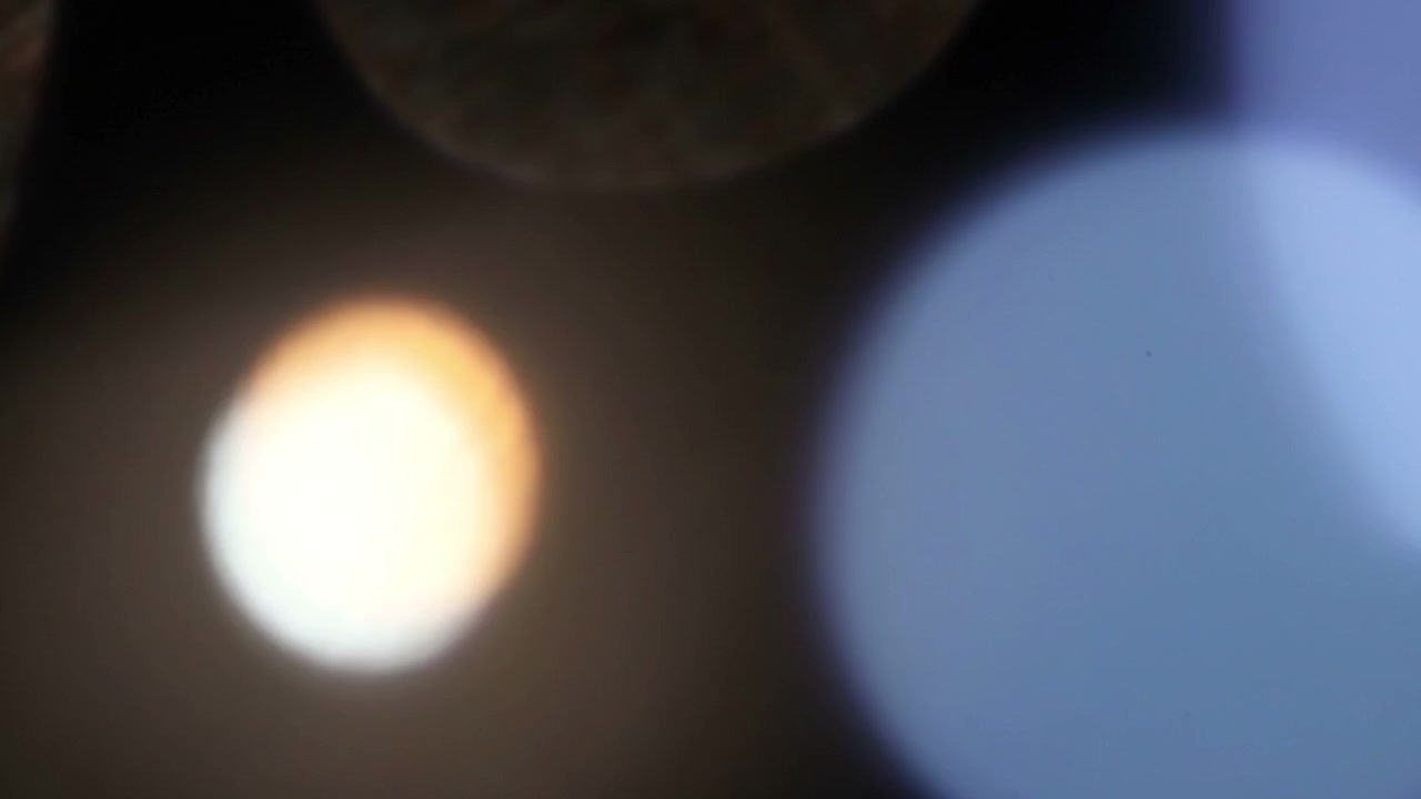 Vazamentos de Luz Abstratos e Sobreposições de Bokeh em Fundo Preto