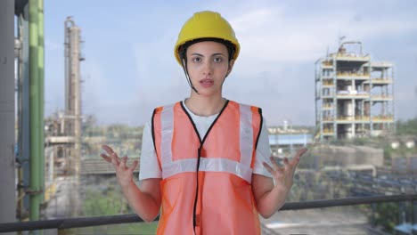 indian female construction worker talking