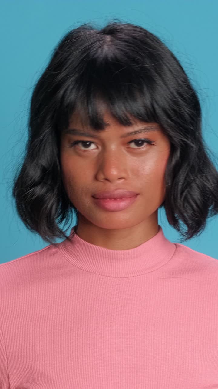 Captivating closeup of a woman with radiant features and vibrant expression