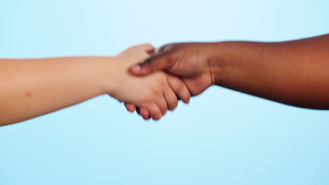 Teamwork, handshake and people in studio