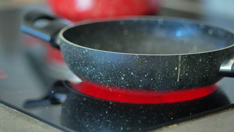 empty pan on a hot electric stove