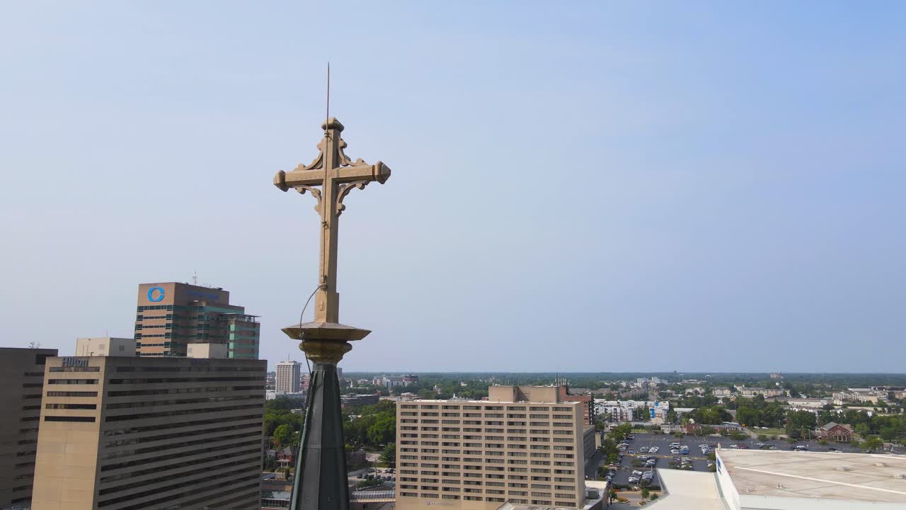 Cross on Historic St Paul Catholic Church in downtown Lexington, close up aerial view