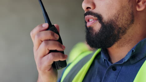 construction worker communicating with walkie-talkie