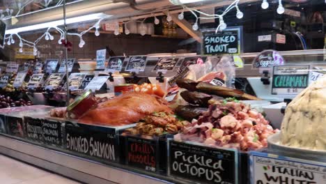 variety of foods displayed at market stall