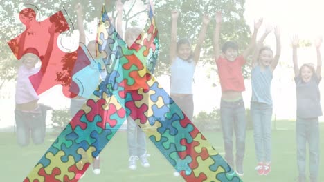 Animation-of-colourful-puzzle-pieces-creating-autism-awareness-ribbon-over-schoolchildren