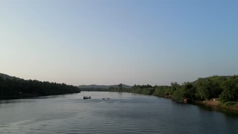 fishing boat stand on karli river water malvan