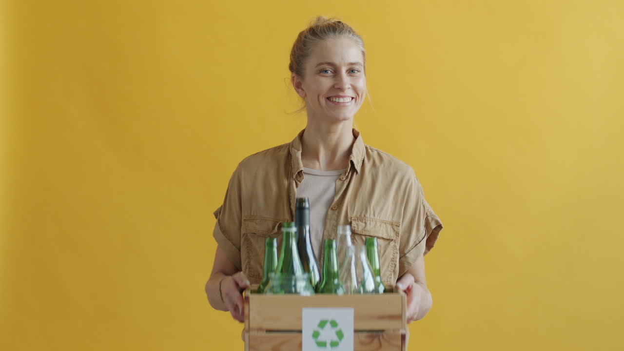 Woman Recycling Glass Bottles