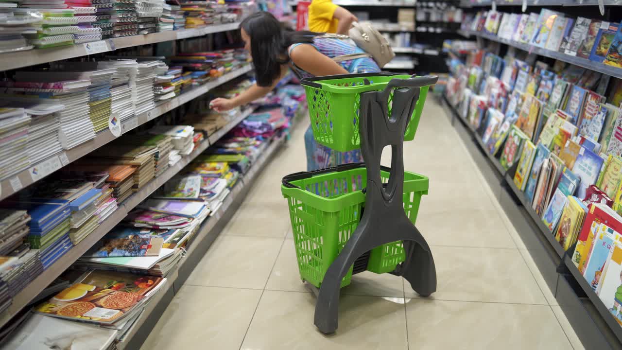 Preparing for september concept. Shopping trolley for shopping in department stores and supermarkets