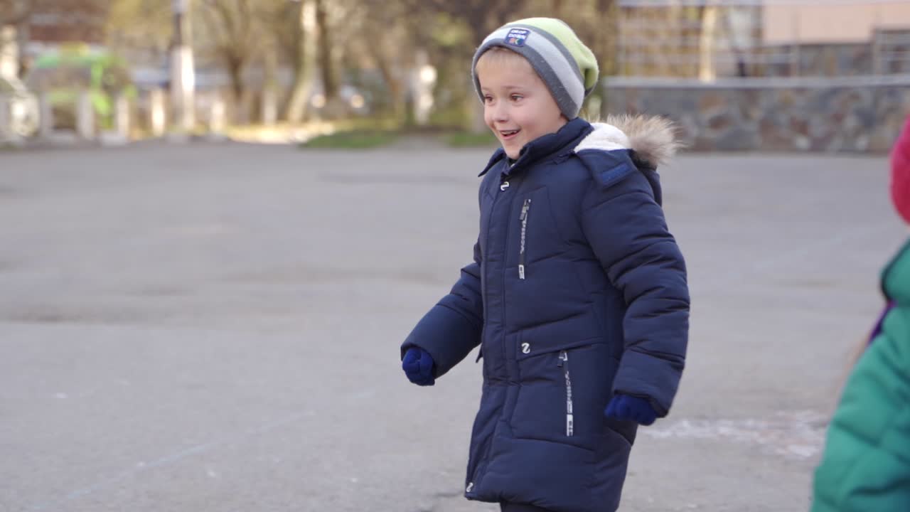 Children walking in a school playground