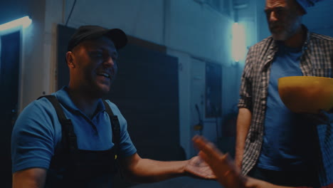 arm wrestling match and post-match wagers among friends