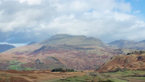 Birker-Fell-timelapse,-November-2022,-clouds-scudding-and-mist-on-top-of-mountain---dslr-timelapse