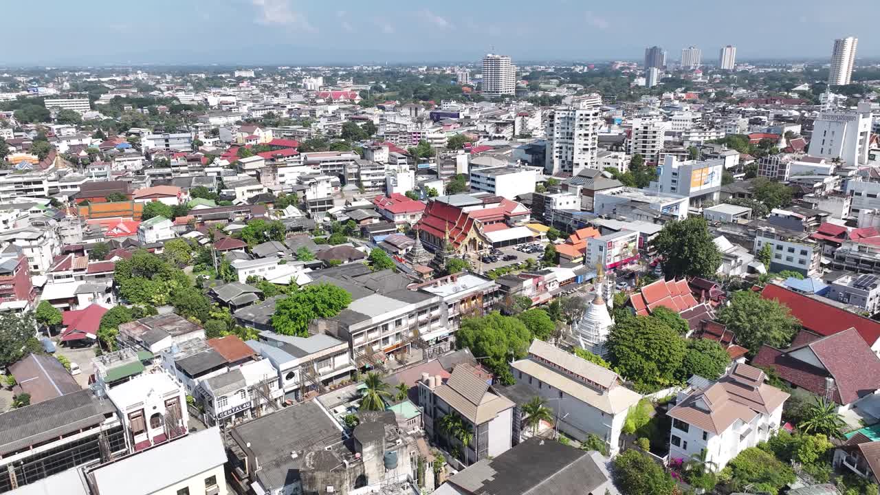 Chiang Mai drone cityscape, mix with traditional and modern buildings in Thai city. Urbanism