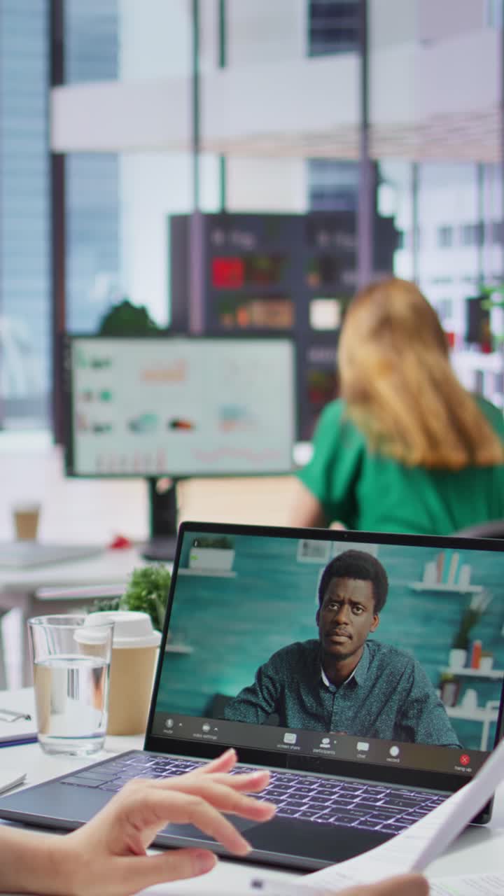 Vertical Video HR recruiter hosting interview with applicant via internet teleconference call